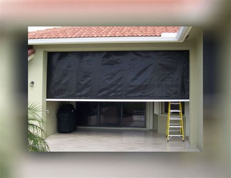 fabric vs metal hurricane shutters|average cost of hurricane screens.